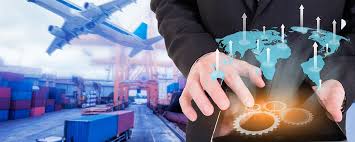 A business professional using a tablet, with graphics of global movements, gears, and an airplane in the background, symbolizing logistics and transport.